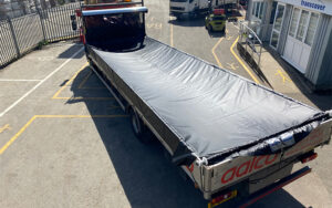 drop side truck with transcover tarp system