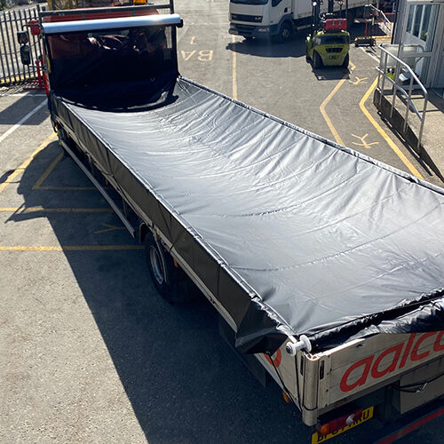drop side truck with transcover tarp system