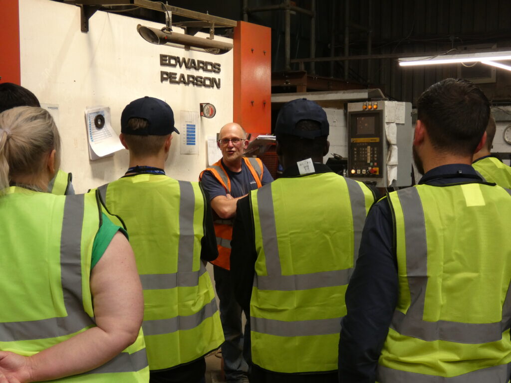 Peter Rank explaining his role at Transcover to students from MidKent College