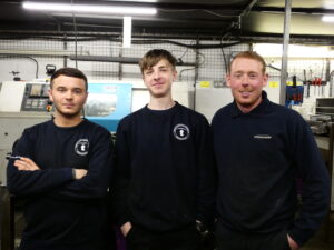 Our apprentice Sam, with the machining team